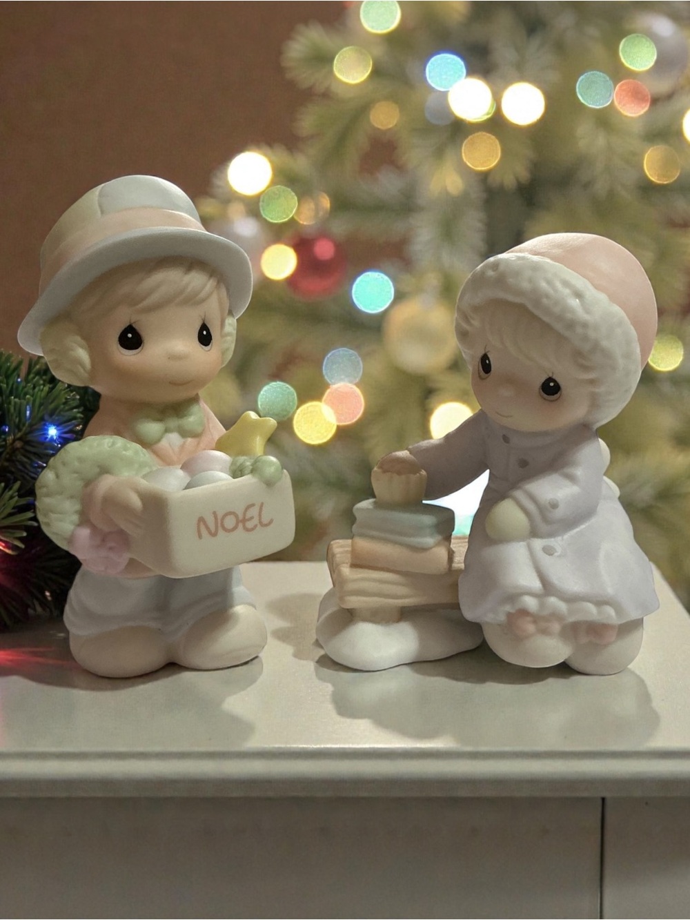 Precious Moments Winter Children Figurine Pair in Pastel Pink and Cream